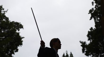 Picture portrays a conductor.