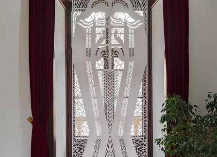 photography. large-format cutout with a traditional pattern, displayed in the window of lubomirski room in the Decius villa.