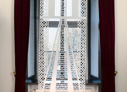 photography. large-format cutout with a traditional pattern, displayed in the window of lubomirski room in the Decius villa.