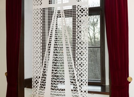 photography. large-format cutout with a traditional pattern, displayed in the window of lubomirski room in the Decius villa.